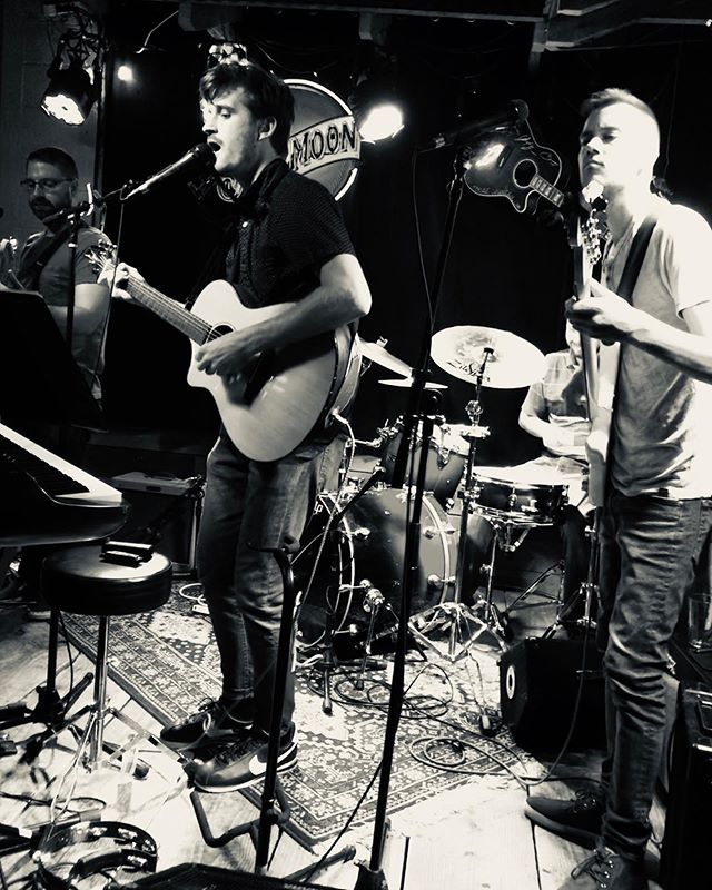 A group of people that are playing music