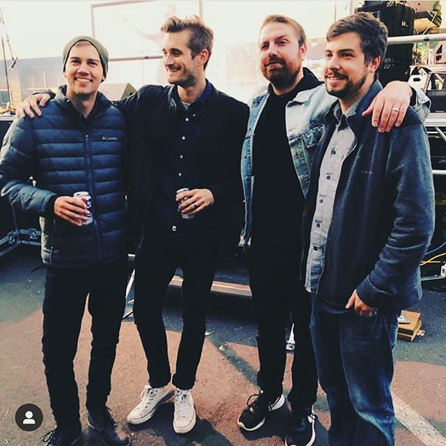 A group of men standing next to each other.