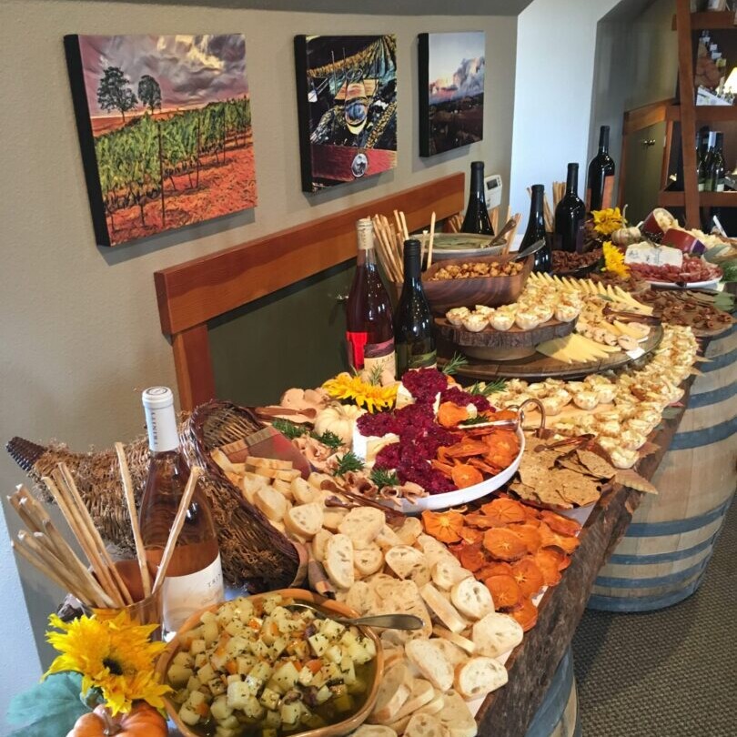 A buffet table with many different types of food.
