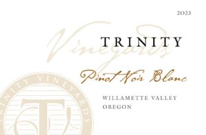 A white label with the words " trinity vineyards pinot noir blend willamette valley oregon ".